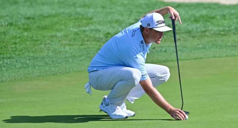 golfer kicks putter